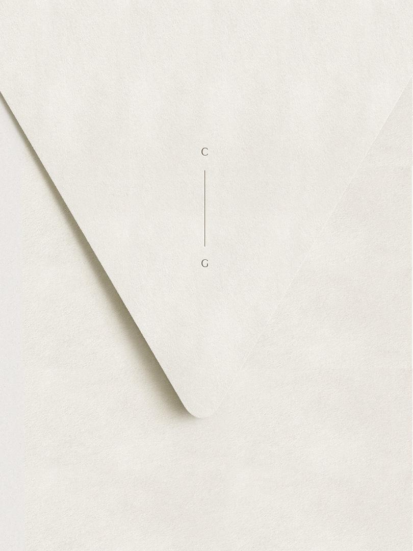 Elegant monogram design inspired by architectural shapes for a digital wedding invitation.